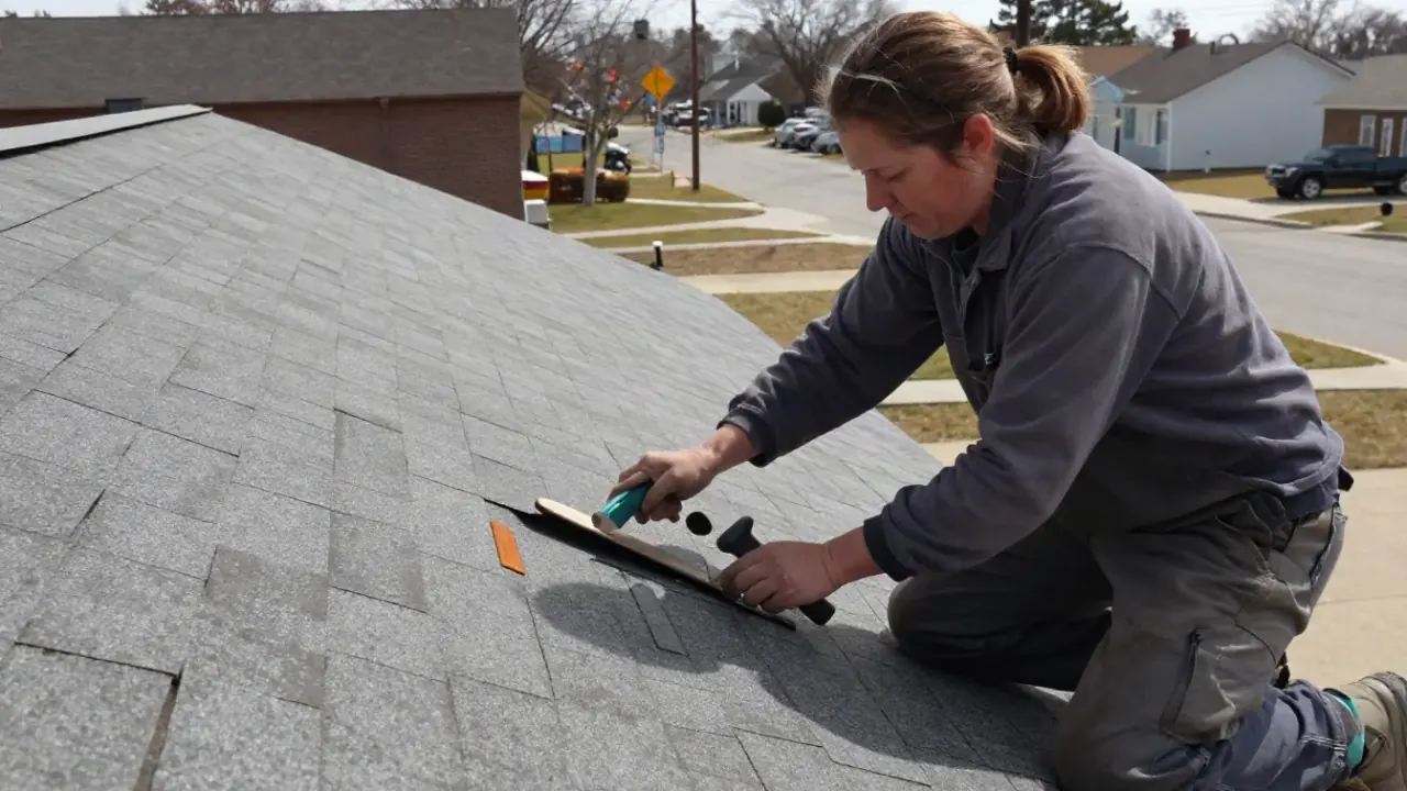 Shingle Leak Repair in Baytown, Texas: professional performing Shingle Leak Repair for a Roof Leak Repair customer, the work